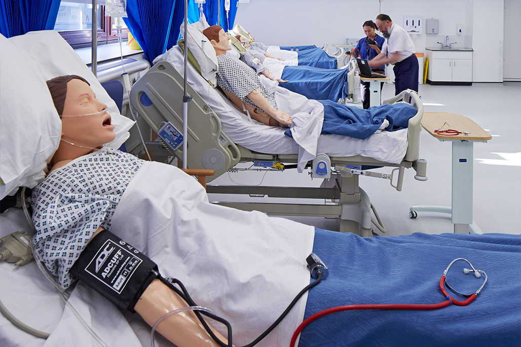 Manikin in a hospital bed